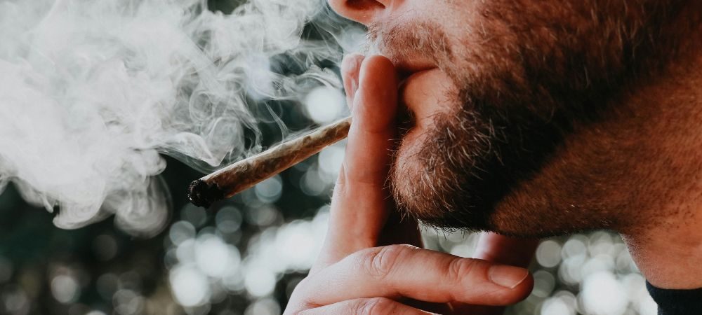 report a neighbor for smoking cannabis