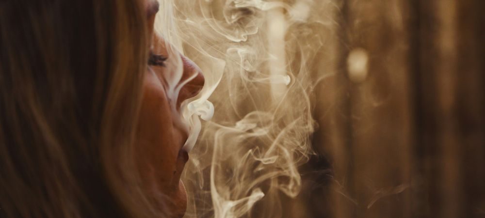 report a neighbor for smoking cannabis
